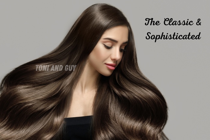 A model showcasing smooth and glossy long hair styled at TONI & GUY Coimbatore for a classic look