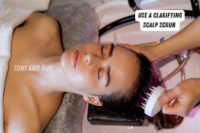 Clarifying scalp scrub treatment at Toni & Guy Coimbatore for deep cleansing and healthy scalp care