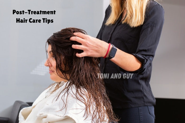 Stylist providing post-treatment hair care guidance to a client at Toni & Guy Coimbatore salon
