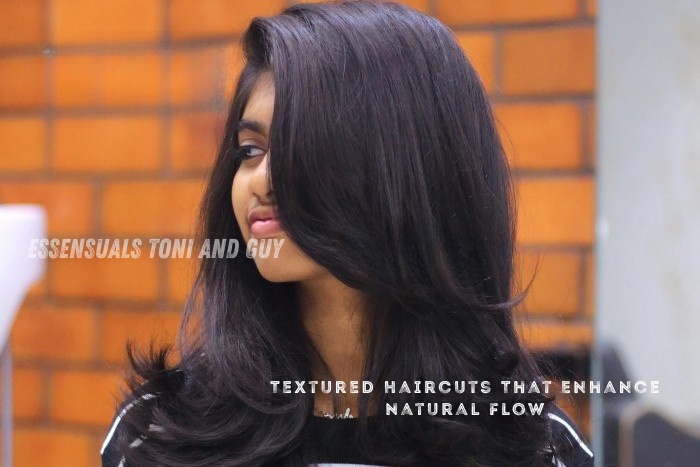 Textured layered haircut by Essensuals Toni & Guy in Race Course, Coimbatore for natural hair flow and volume